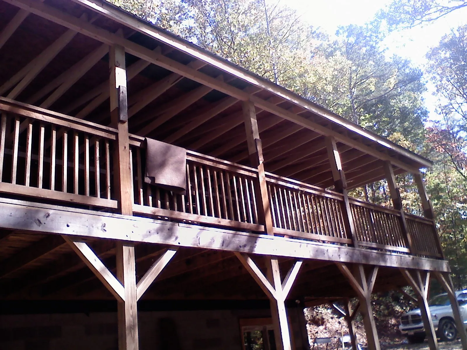 Timber framing under a new elevated porch and deck — Roof Leak Repair in Oregon City by Roofing Brothers